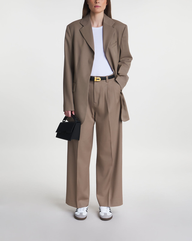 Teurn Studios Relaxed-fit pleated trousers Beige 36